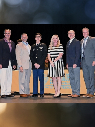 In photo, from left: Former State Sen. Ernie Lopez, former State Rep. Steve Smyk; 2022-23 Cadet of the Year Tyler Haun; Cape Henlopen High School Principal Kristin DeGregory; State Rep. Jeff Hilovsky; and Cape Henlopen Superintendent Bob Fulton.